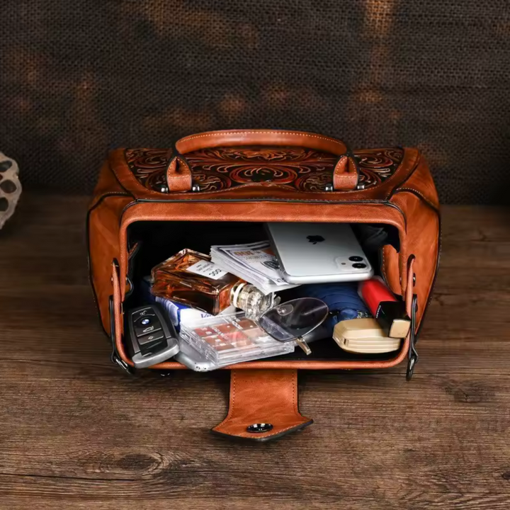 Florina - Handväska i läder med gravyr och blommönster